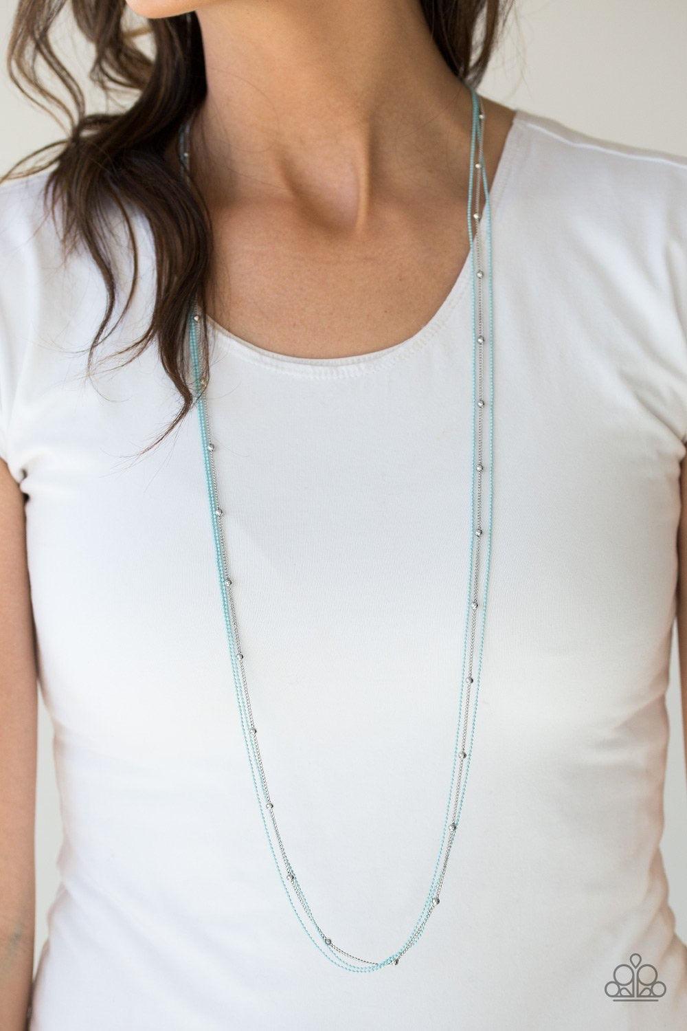Paparazzi Accessories Colorfully Chic - Blue Painted in a refreshing blue finish, dainty ball-chains and a shimmery silver satellite chain drapes across the chest for a colorful industrial look. Features an adjustable clasp closure. Sold as one individual