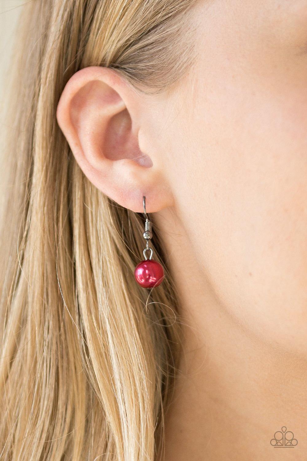 Paparazzi Accessories Color Me CEO - Red Dusted in glitter, sparkling gunmetal and pearly red beads are threaded along an invisible wire below the collar for a glamorous look. Features an adjustable clasp closure. Jewelry