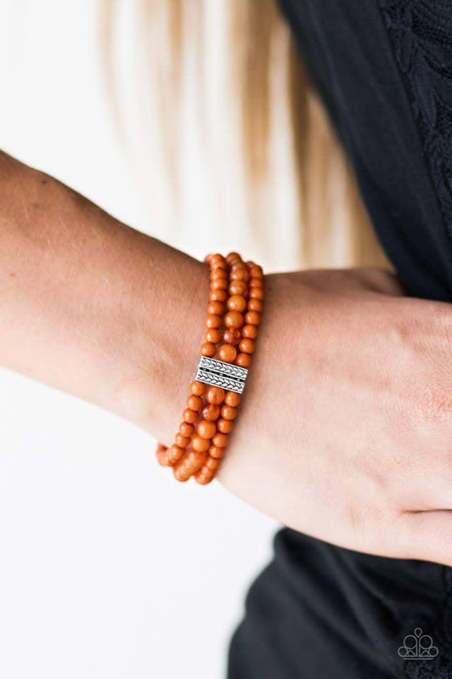Paparazzi Accessories Malibu Muse - Orange Polished and opaque orange beading are threaded along elastic stretchy bands. Infused with ornate silver accents, the colorful strands join into a single bracelet. Jewelry