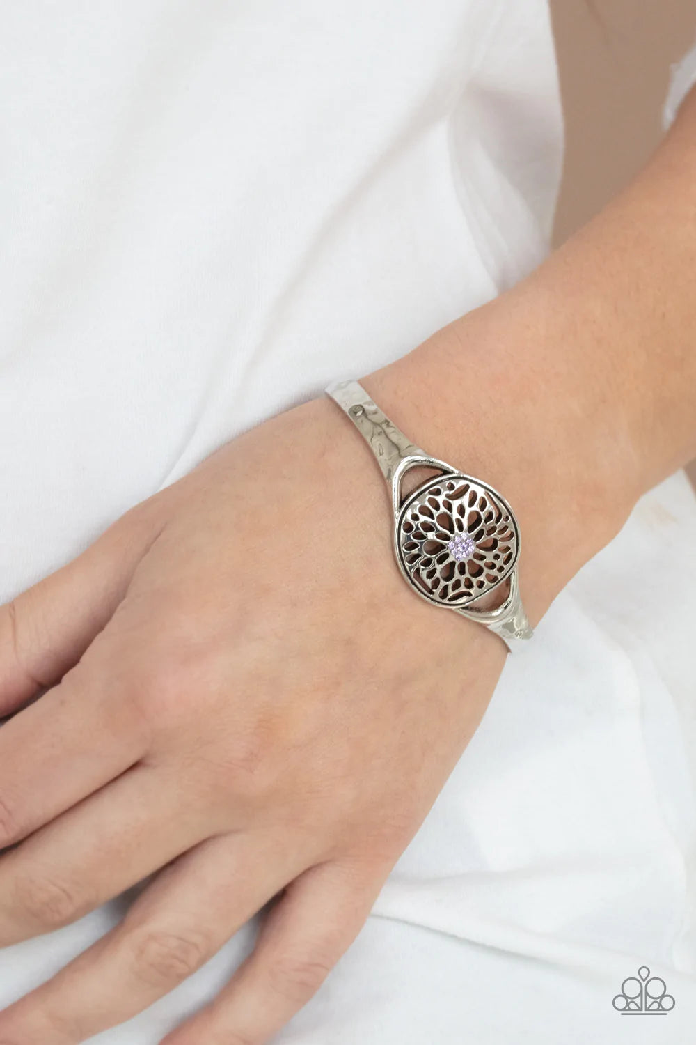 Paparazzi Accessories Modern Meadow - Purple Dotted with a glassy purple rhinestone center, an airy floral frame adorns the center of a dainty silver cuff for a whimsical shine. Sold as one individual bracelet. Bracelets
