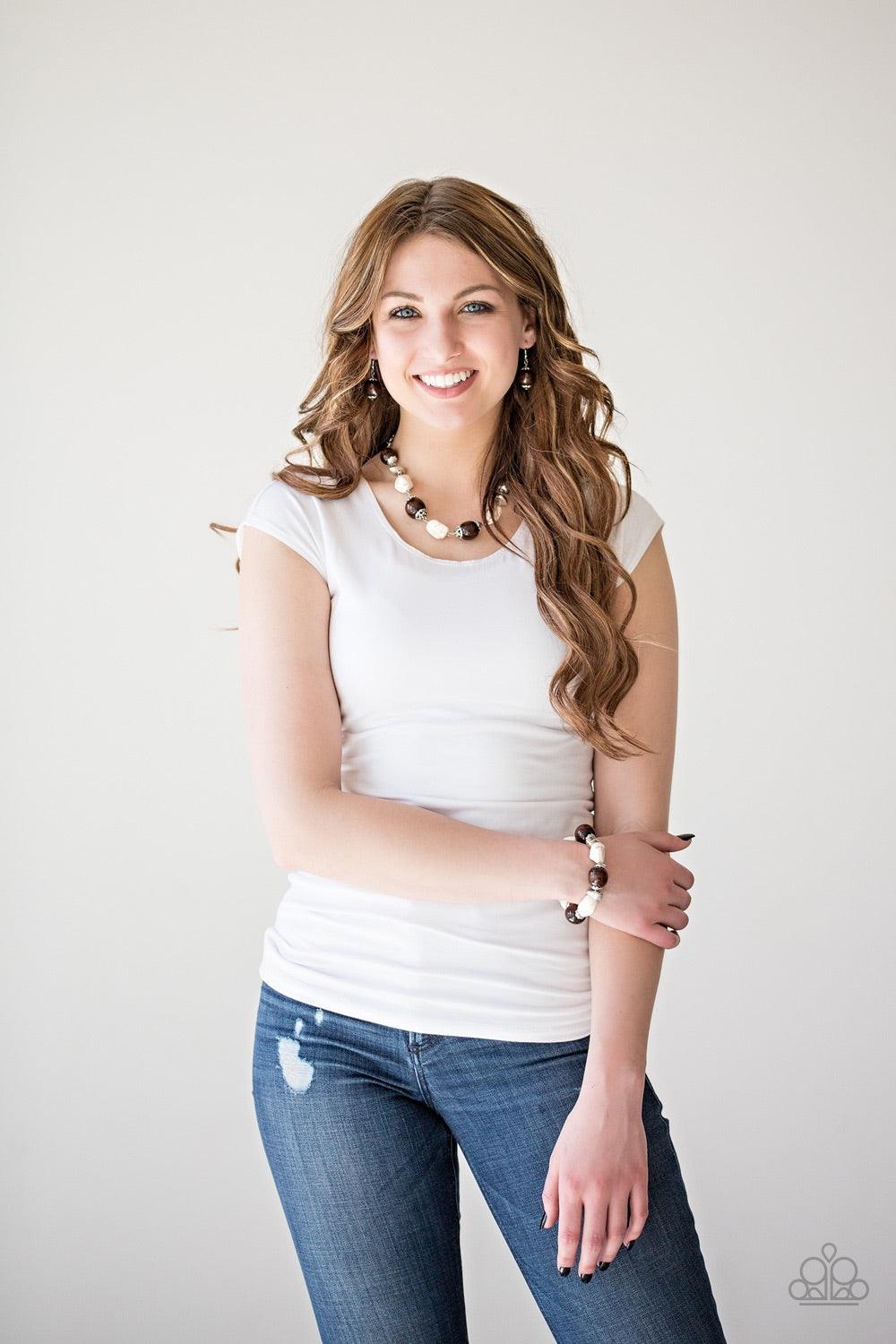 Paparazzi Accessories Gorgeously Grounded - White Infused with ornate silver accents, refreshing white stones and earthy wooden beads are threaded along a stretchy elastic band for a seasonal look. Jewelry