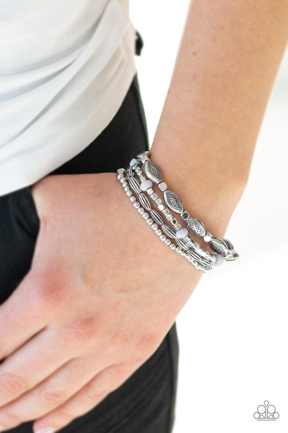 Paparazzi Accessories Full of WANDER - Silver A collection of mismatched silver beads, silver cubes, and faceted gray beads are threaded along four stretchy bands around the wrist for a colorful flair. Jewelry