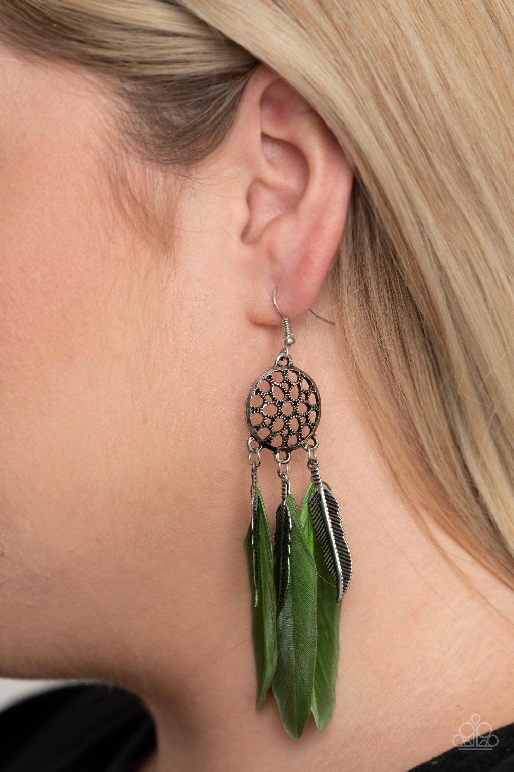 Paparazzi Accessories In Your Wildest DREAM-CATCHERS - Green Earthy green feathers and antiqued silver feather charms swing from the bottom of an ornate silver frame, creating a wildly colorful dream-catcher. Earring attaches to a standard fishhook fittin