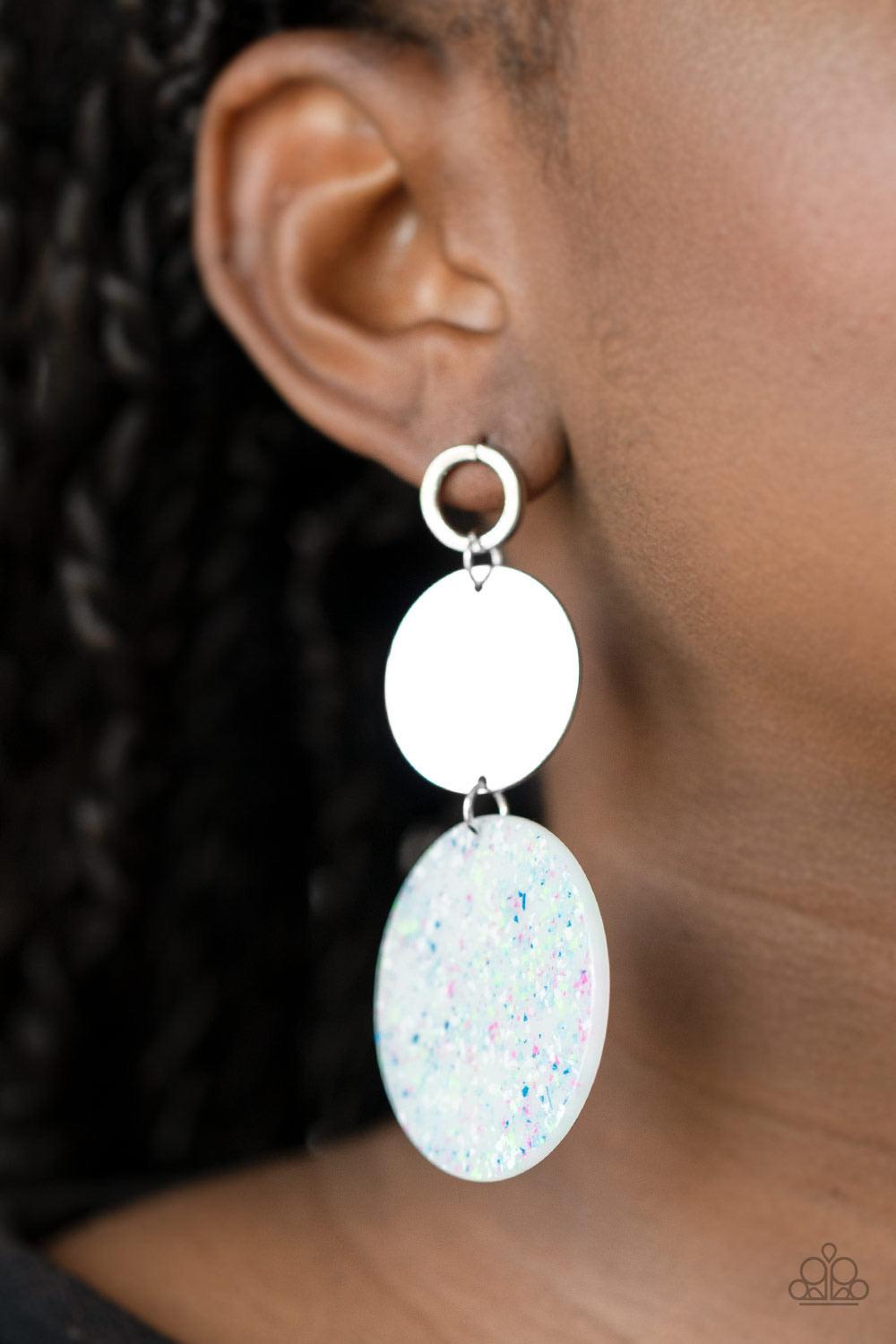 Paparazzi Accessories Beach Day Glow - Blue A speckled acrylic circle swings from the bottom of a glistening silver disc that is attached to an airy circle fitting. The shiny trio links into a colorful lure for a retro look. Earring attaches to a standard