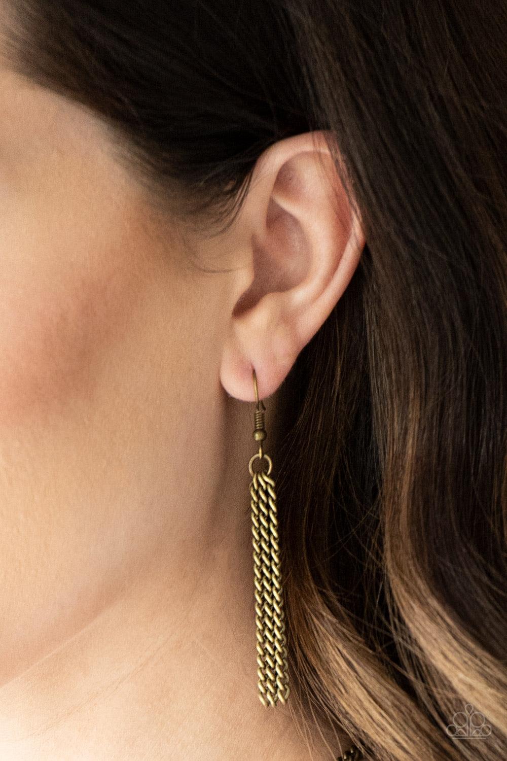 Paparazzi Accessories Free Bird - Brass Featuring studded and antiqued textures, a dramatic brass feather pendant swings from the bottom of an elongated brass chain for a free-spirited fashion. Features an adjustable clasp closure. Jewelry