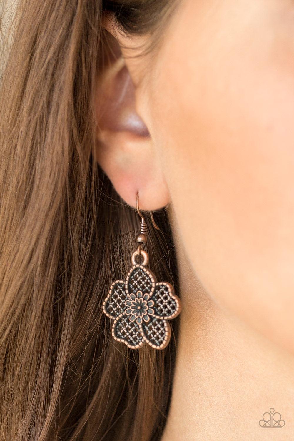 Paparazzi Accessories Petunia Paradise - Copper Featuring lattice-like patterns, shimmery copper flowers bloom below the collar for a seasonal look. Features an adjustable clasp closure. Jewelry