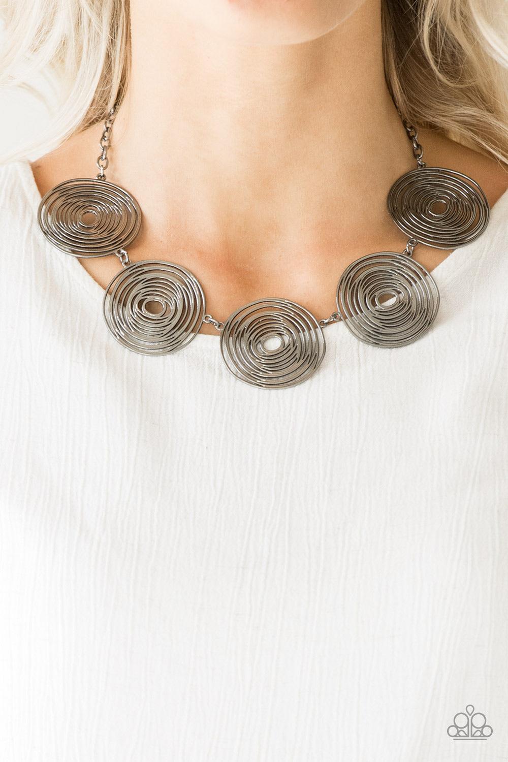 Paparazzi Accessories SOL-Mates - Black Brushed in a high-sheen finish, swirling gunmetal frames link below the collar for a seasonal look. Features an adjustable clasp closure. Jewelry