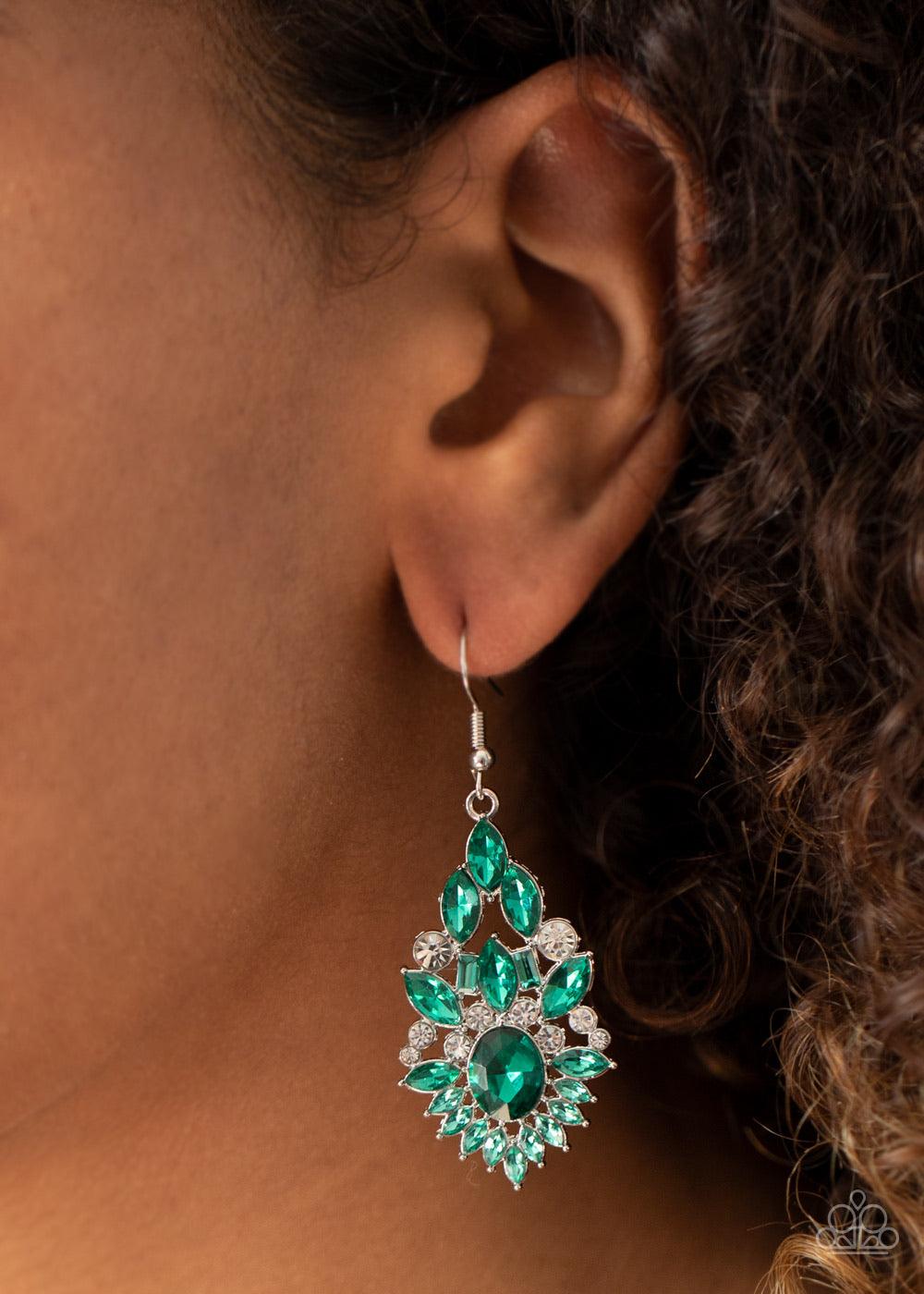 Paparazzi Accessories Ice Castle Couture - Green Featuring an elegant variety of round, marquise, oval, and emerald style cuts, a glittery collision of green and white rhinestones delicately coalesce into a jaw-dropping lure. Earring attaches to a standar
