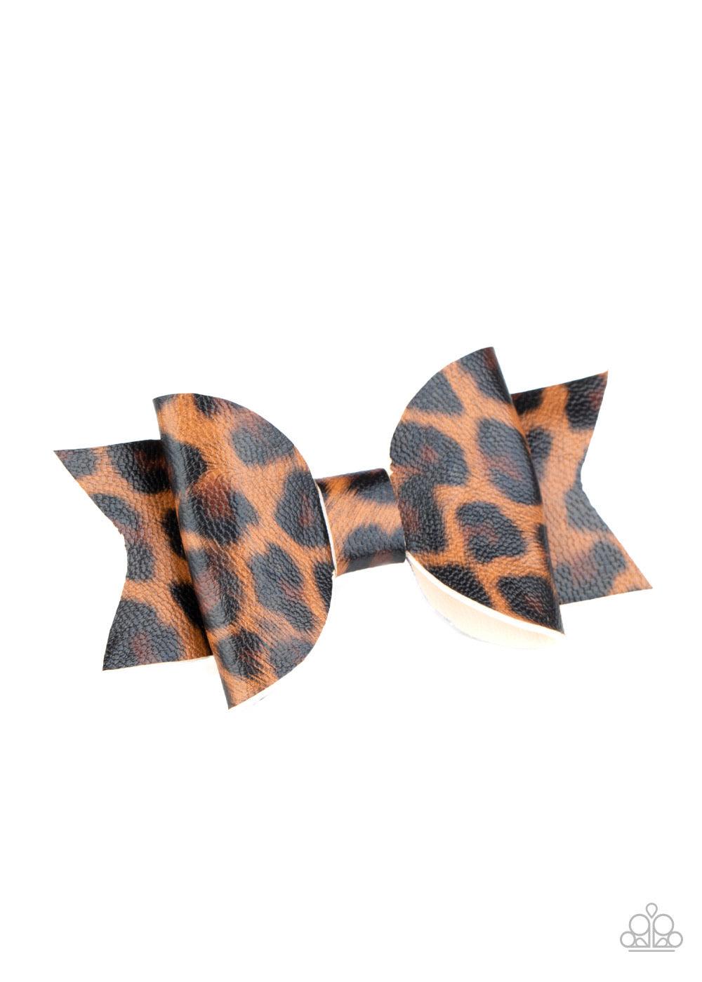 Paparazzi Accessories Hooked On A FELINE - Brown Featuring a brown and black cheetah print, a shiny piece of leather delicately knots into a wild bow. Features a standard hair clip on the back. Sold as one individual hair clip. Hair Accessories