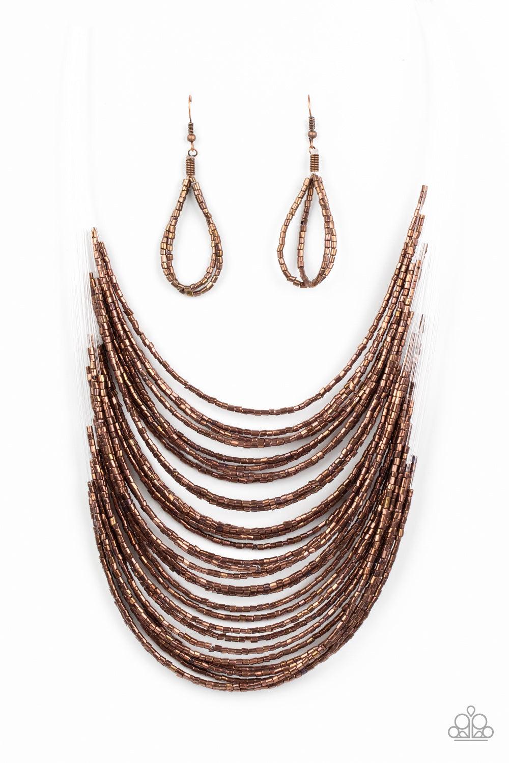 Paparazzi Accessories Catwalk Queen - Copper Strand after strand of metallic copper seed beads fall together to create a bold statement piece. Features an adjustable clasp closure. Sold as one individual necklace. Includes one pair of matching earrings. J