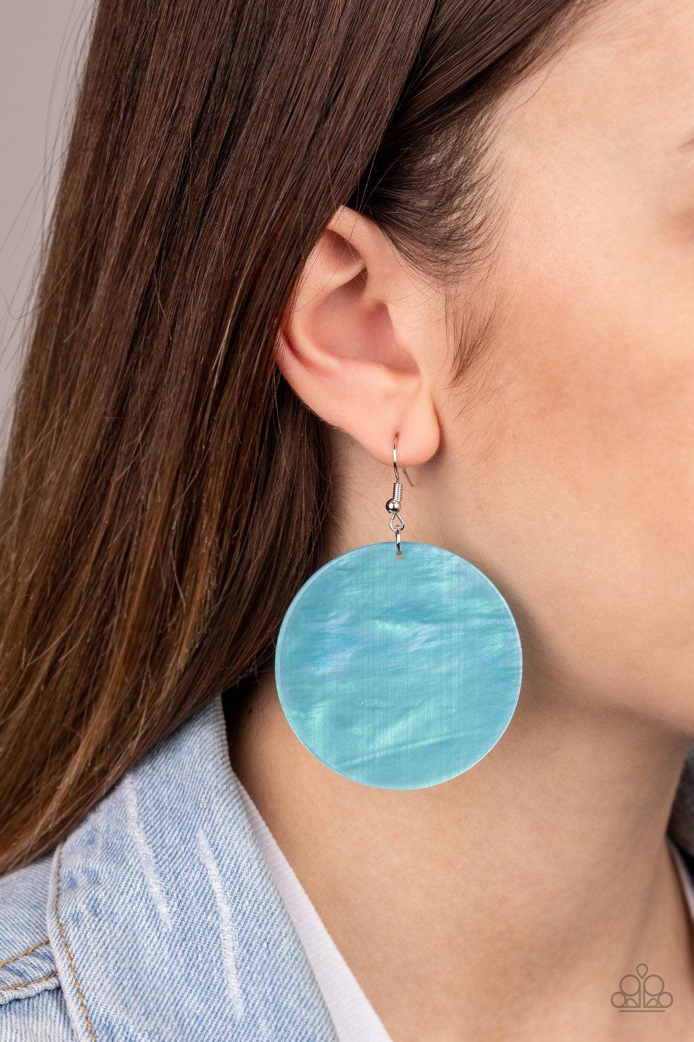 Paparazzi Accessories Cosmic Rainbow - Multi Brushed in a rainbow iridescence, a circular blue acrylic frame swings from the ear for an out of this world style. Earring attaches to a standard fishhook fitting. Color may vary. Jewelry