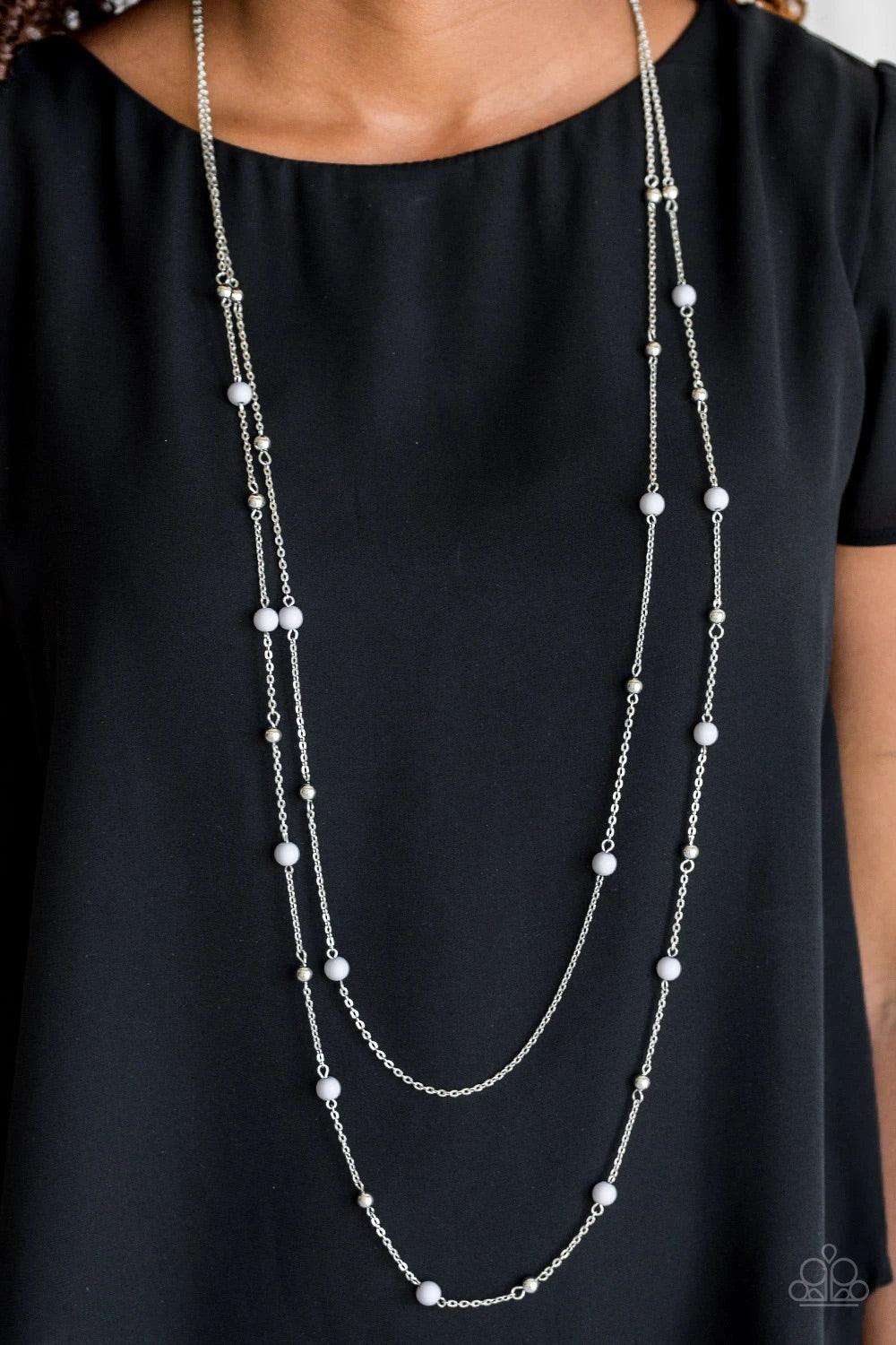Paparazzi Accessories Beach Party Pageant - Silver Neutral gray and dainty silver beads trickle along two shimmery silver chains, creating colorful layers down the chest. Features an adjustable clasp closure. Jewelry