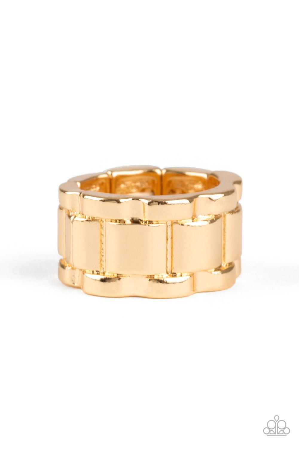 Paparazzi Accessories Modern Machinery - Gold Embossed in a tread-like pattern, an ornate gold band arcs across the finger for a bold look. Features a stretchy band for a flexible fit. Sold as one individual ring. Jewelry