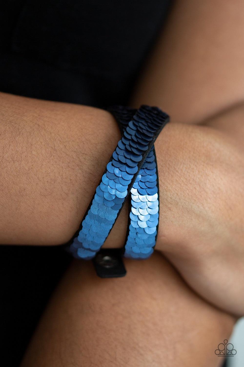 Paparazzi Accessories Under The SEQUINS - Purple Row after row of shimmery sequins are stitched across the front of a lengthened black suede band. The elongated band allows for a trendy double wrap design. Bracelet features reversible sequins that change