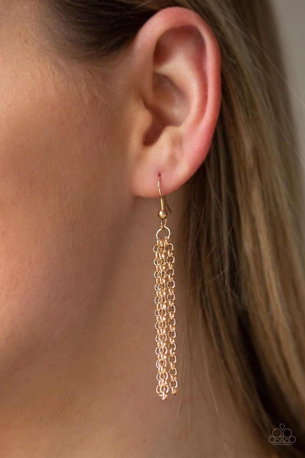 Paparazzi Accessories On The ROAM Again - Gold As if chipped off a cliff, pieces of turquoise rock link at the bottom of a lengthened gold chain for an earthy look. As the stone elements in this piece are natural, some color variation is normal. Features