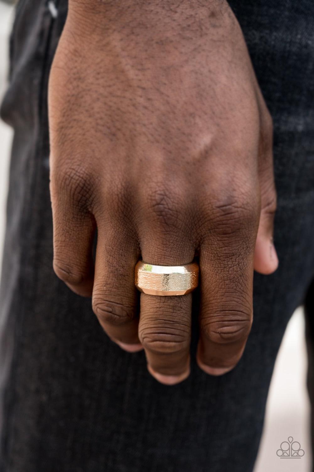 Paparazzi Accessories Checkmate - Gold The center of a beveled gold band has been delicately hammered in shimmery detail for a metro inspired look. Features a stretchy band for a flexible fit. Jewelry