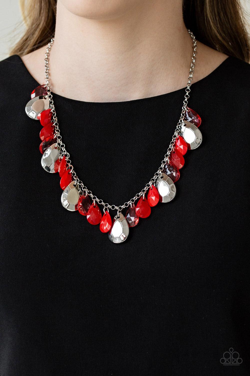Paparazzi Accessories Hurricane Season - Red Glassy and polished red teardrops drip from the bottom of a shimmery silver chain. Faceted silver teardrops trickle between the colorful beading, adding a flashy finish to the flirtatious fringe. Features an ad