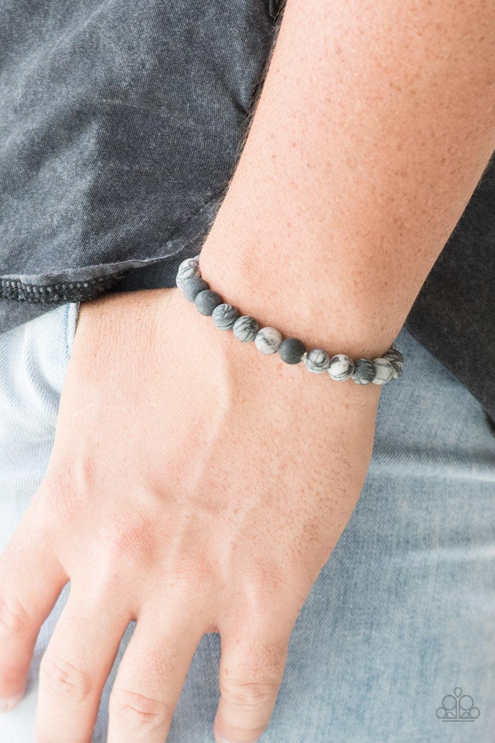 Paparazzi Accessories Oblivion - Silver Swirling with dizzying detail, natural stones are threaded along a stretchy band for a seasonal look. Sold as one individual bracelet. Jewelry