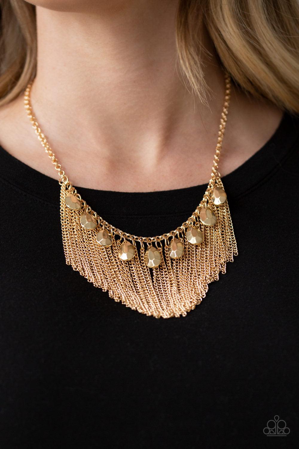 Paparazzi Accessories Bragging Rights - Gold A row of faceted gold teardrops and free-falling gold chains drape below the collar, creating a dramatic fringe for a show-stopping style. Features an adjustable clasp closure. Jewelry