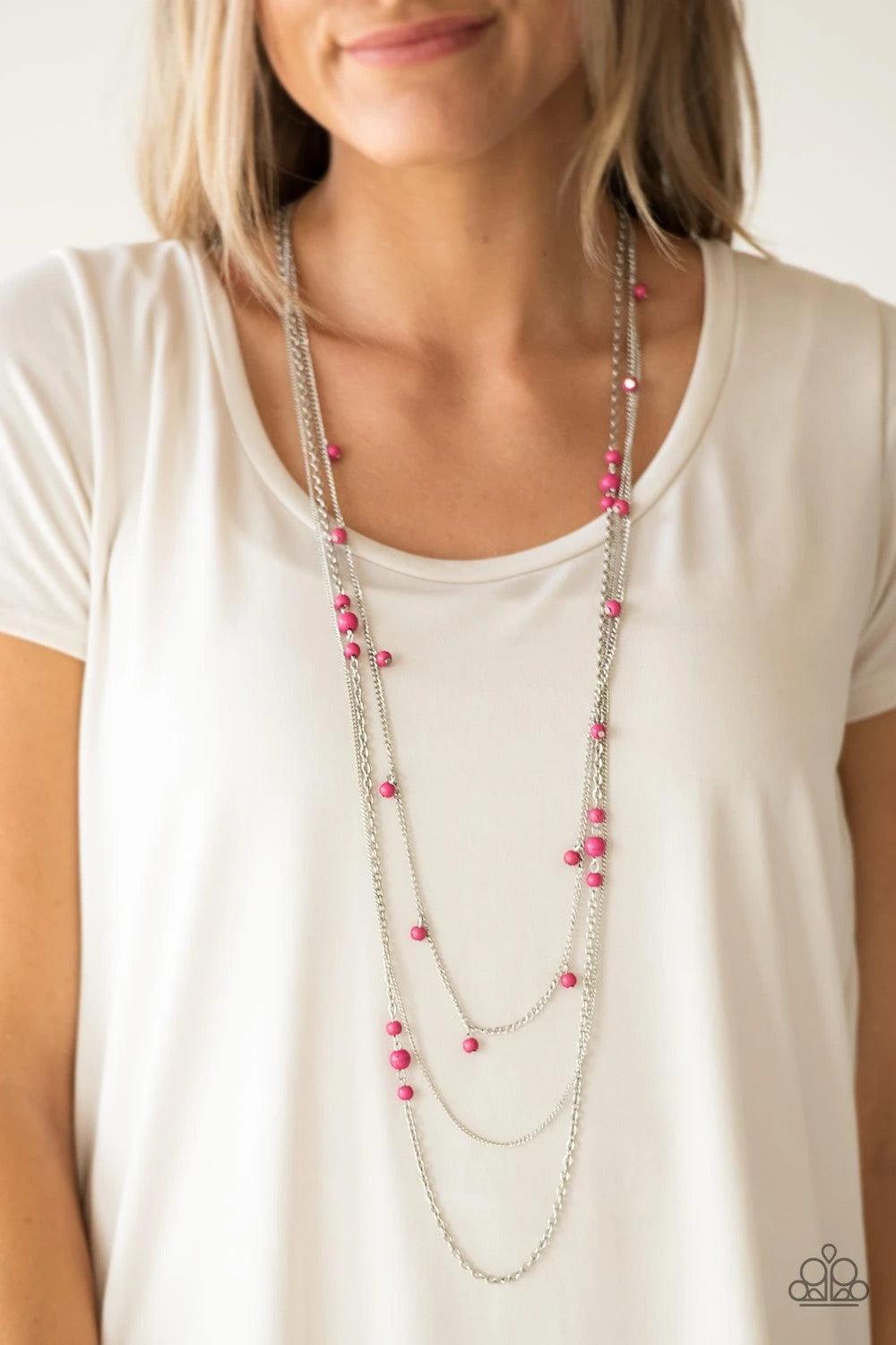Paparazzi Accessories Laying The Groundwork - Pink Infused with a plain silver chain, mismatched pink stone beads sporadically trickle along shimmery silver chains, creating vivacious layers down the chest. Features an adjustable clasp closure. Sold as on