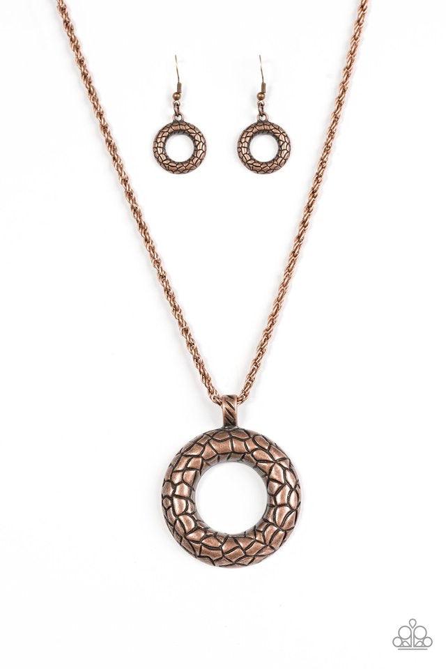 Paparazzi Accessories Pretty as a Prowess - Copper Embossed in a metallic stone pattern, a bold copper frame swings from the bottom of a glistening copper chain for an edgy look. Features an adjustable clasp closure. Sold as one individual necklace. Inclu