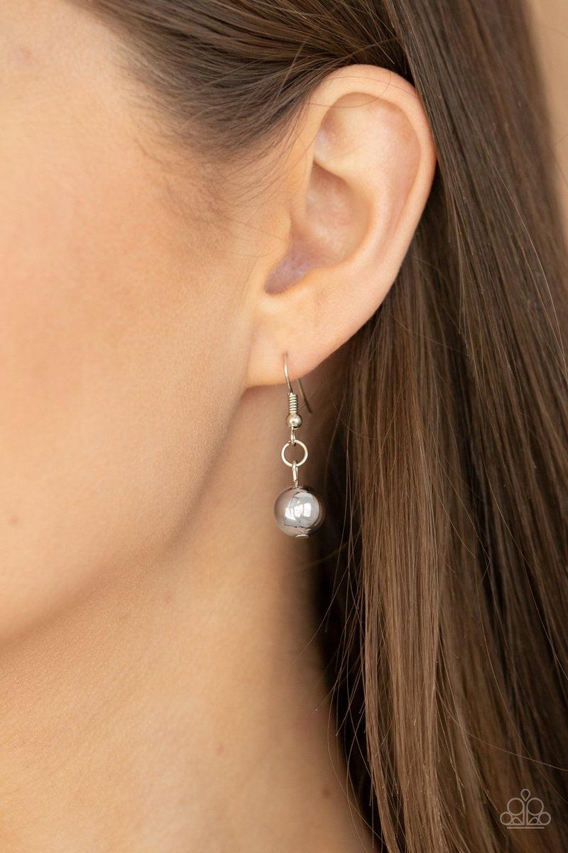 Paparazzi Accessories Hand-Knotted Knockout - White Hand-Knotted Knockout White โ Paparazzi Necklace. Shiny silver beads are knotted in place along strands of white cording that have been knotted into an edgy tassel at the bottom of matching lengthened co