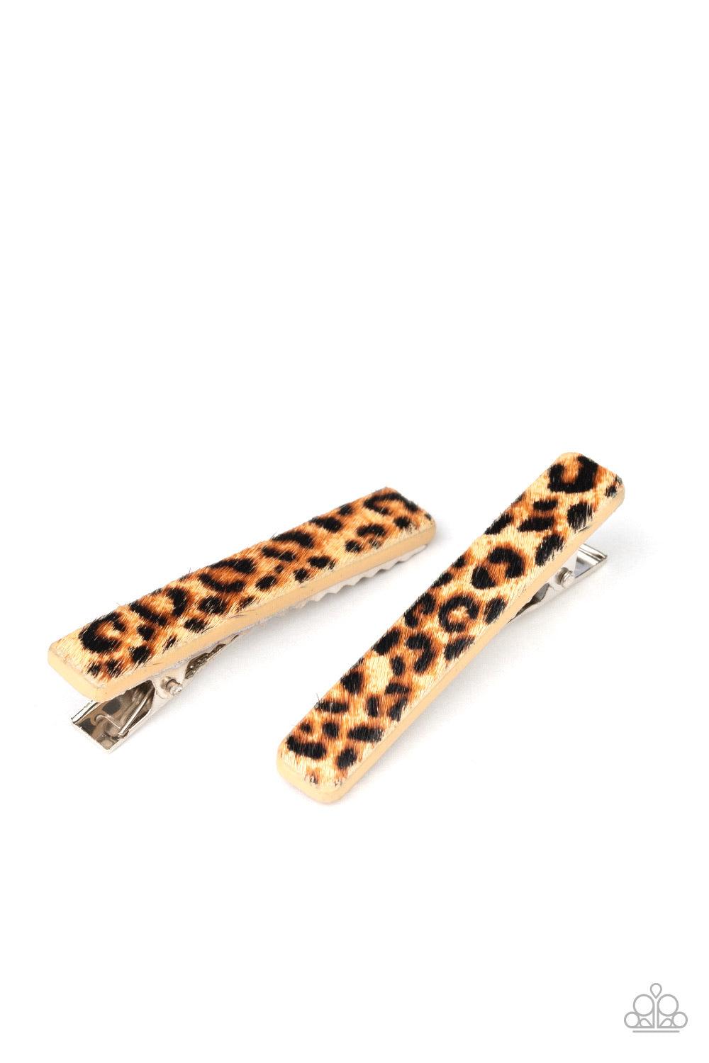 Paparazzi Accessories Going GRR-eat Lengths - Brown Featuring a fuzzy brown and black cheetah pattern, a pair of tan clips pin back the hair for a wildly wonderful look. Features a standard hair clip on the back. Hair Accessories