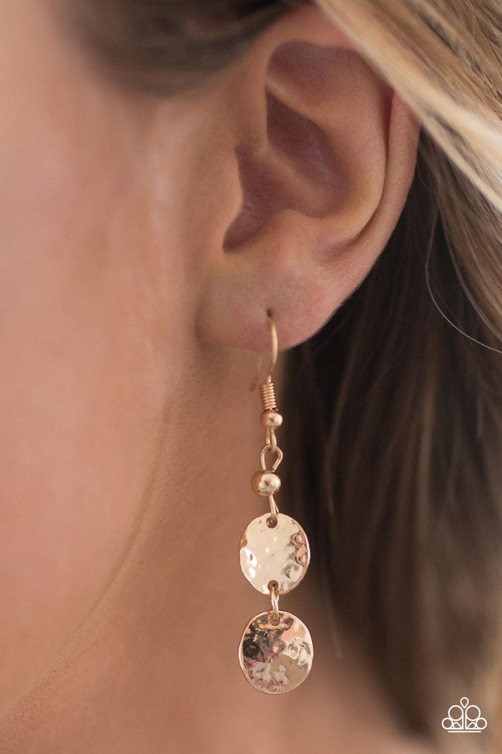 Paparazzi Accessories GLEAM Machine - Gold Delicately hammered with shimmery textures, two dainty gold discs link together, creating a gleaming lure. Earring attaches to a standard fishhook fitting. Jewelry