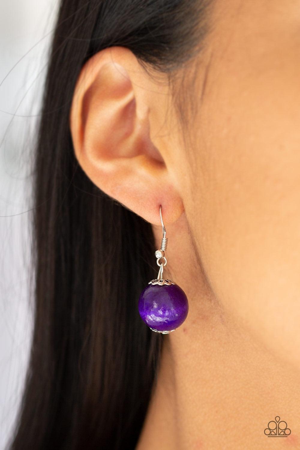 Paparazzi Accessories Tahiti Tropic - Purple Brushed in a flirty purple finish, strands of vivacious wooden beads subtly twist across the chest for a summery look. Jewelry