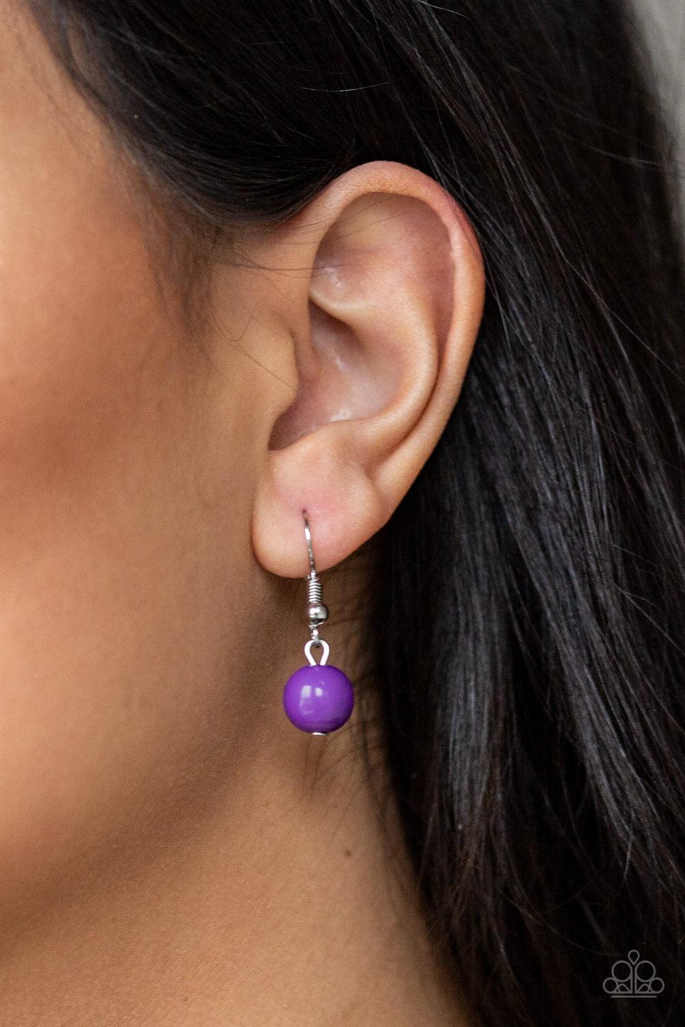 Paparazzi Accessories Modern Motley - Purple Vivacious purple beads, shiny silver beads, and glistening silver hoops give way to layers of mismatched silver chains for a whimsical look. Features an adjustable clasp closure. Sold as one individual necklace