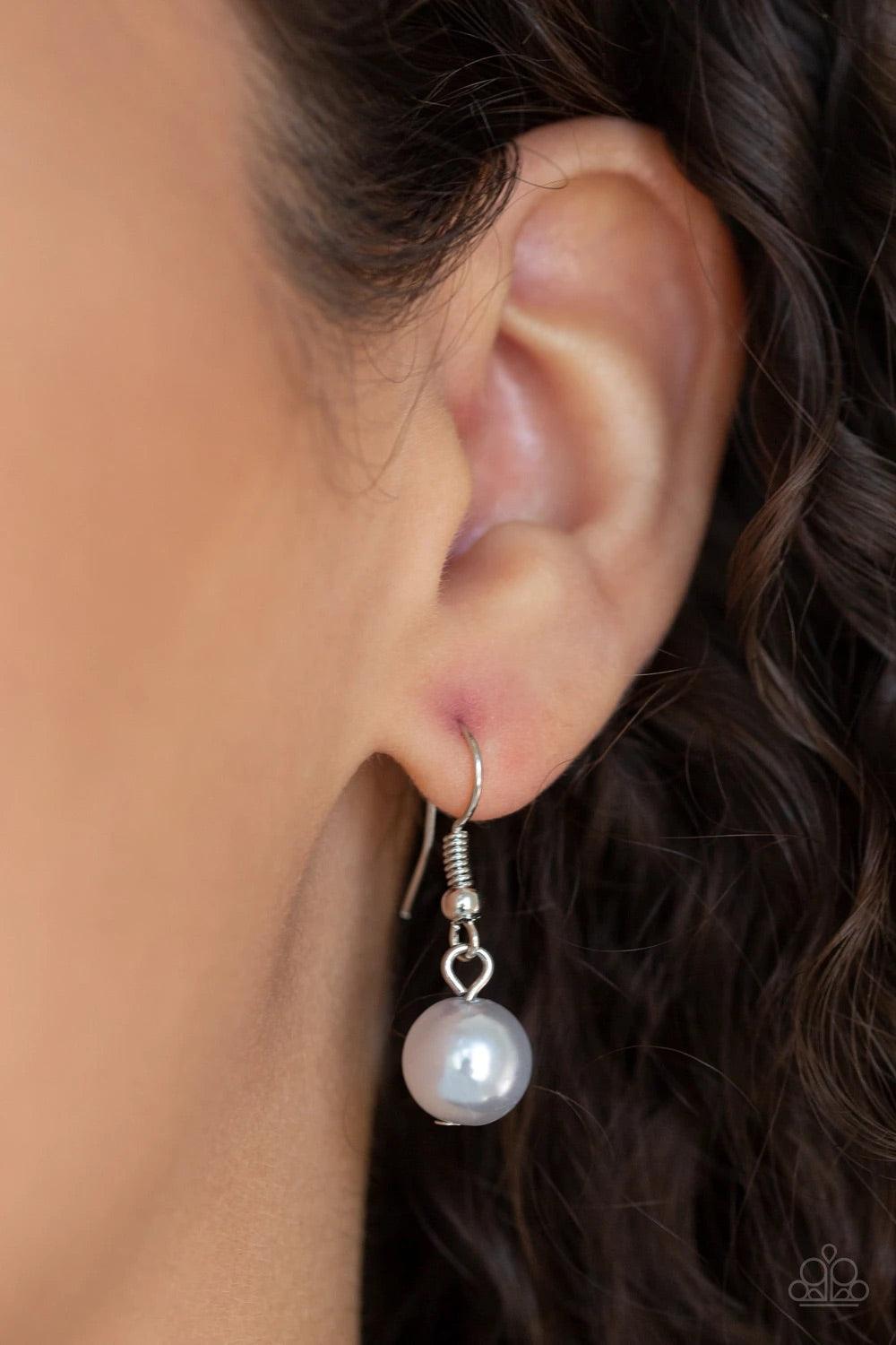 Paparazzi Accessories SoHo Sweetheart - Silver Threaded along an invisible wire, dainty silver pearls give way to an alternating collection of larger silver pearls and white rhinestone encrusted rings below the collar for a timeless sparkle. Features an a