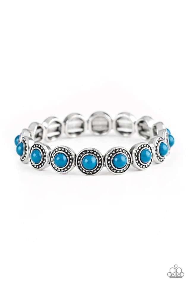 Paparazzi Accessories Globetrotter Goals - Blue Dotted with refreshing blue beaded centers, studded silver frames are threaded along stretchy elastic bands and linked around the wrist for a whimsical look. Jewelry