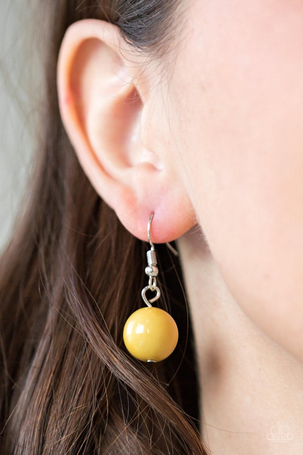 Paparazzi Accessories Top Pop - Yellow Polished yellow beads and dramatic silver beads drape below the collar for a perfect pop of color. Features an adjustable clasp closure. Jewelry