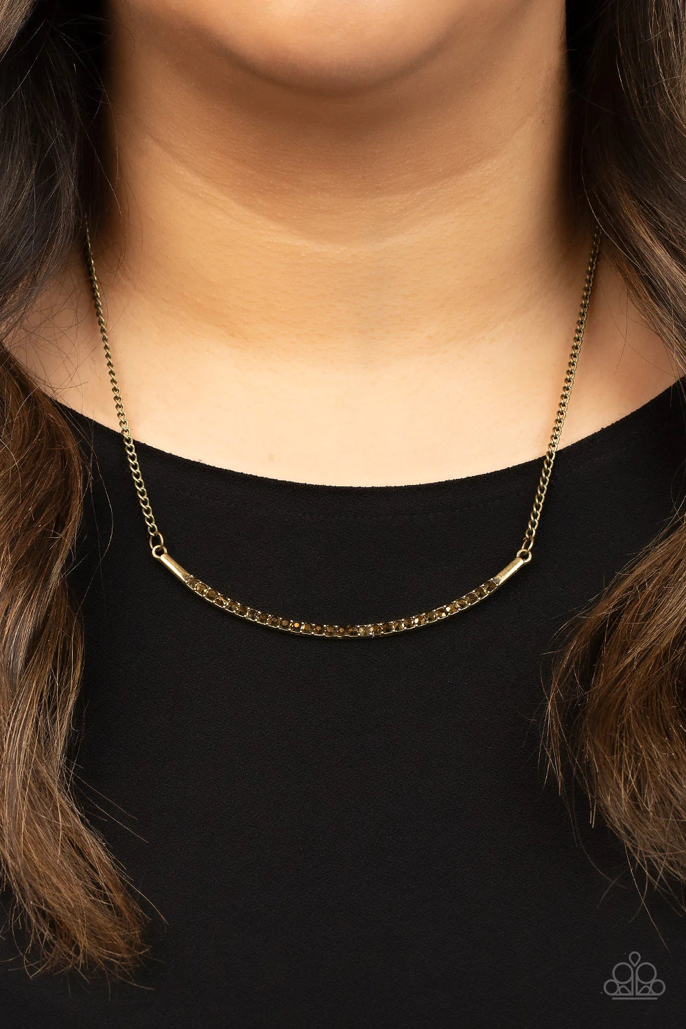 Paparazzi Accessories Collar Poppin’ Sparkle - Brass Encrusted in glitzy aurum rhinestones, a curved brass bar bows below the collar for a smoldering style. Features an adjustable clasp closure. Sold as one individual necklace. Includes one pair of matchi