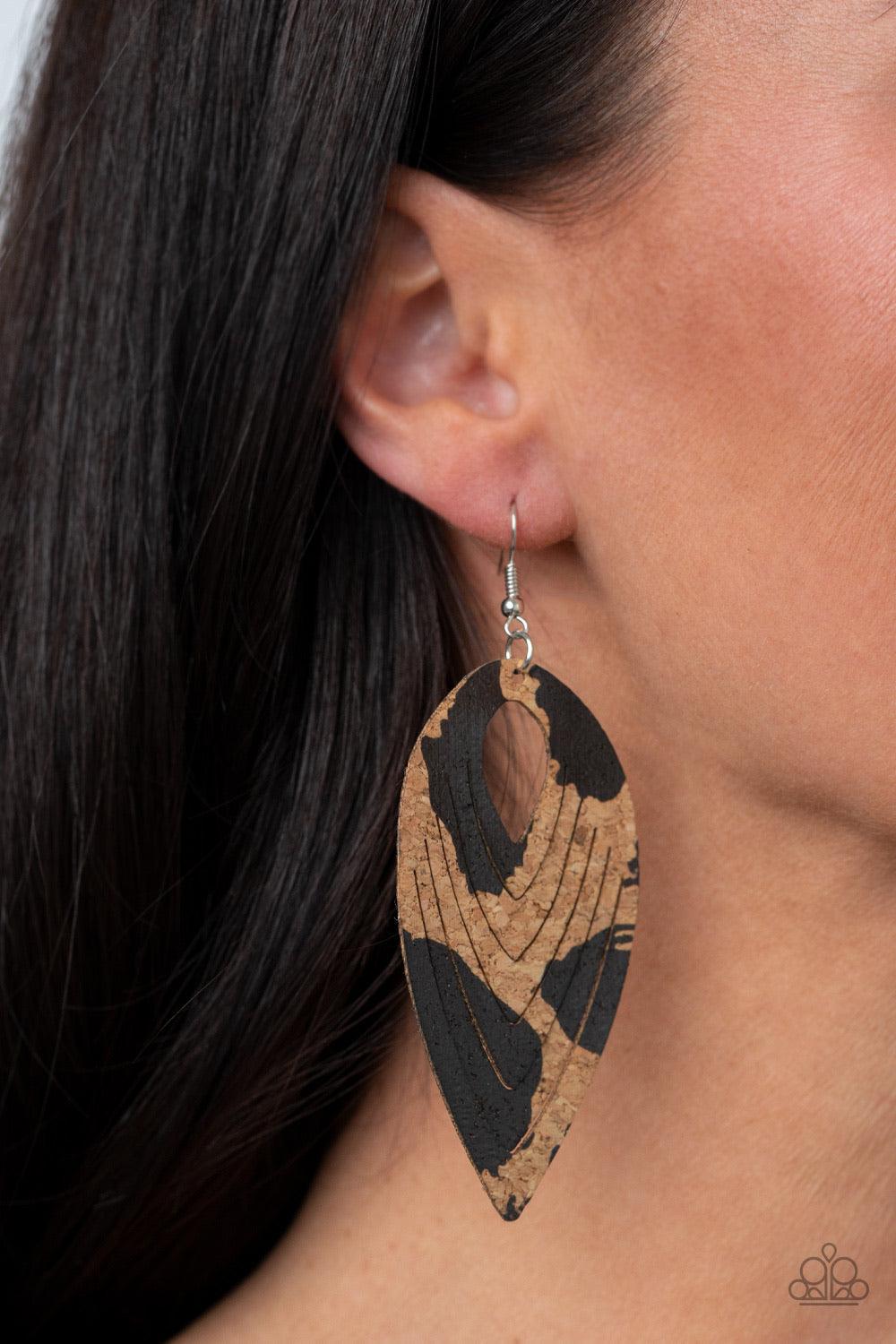 Paparazzi Accessories Cork Cabana - Black Spotted in shiny black accents, a flat cork teardrop is spliced into a rippling frame for an earthy fashion. Earring attaches to a standard fishhook fitting. Sold as one pair of earrings. Jewelry
