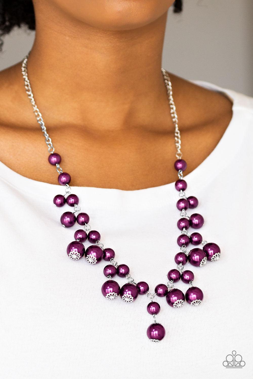 Paparazzi Accessories Soon To Be Mrs. - Purple Varying in size, bubbly purple pearls swing from the bottom of a classic strand of pearls, creating a refined fringe below the collar. Features an adjustable clasp closure. Jewelry