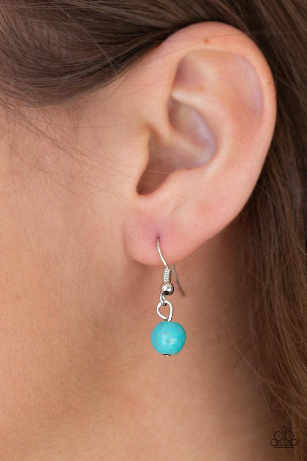 Paparazzi Accessories Rural Revival - Blue Shiny silver beads are threaded along an invisible wire below the collar. Infused with silver beaded accents, refreshing turquoise beads swing from the bottom of the beaded strand, creating an earthy fringe. Feat