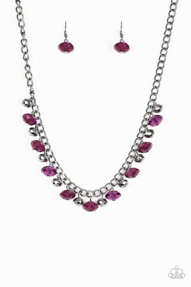 Paparazzi Accessories Runway Rebel - Purple Featuring cloudy and glassy finishes, faceted purple crystal-like beads swing from the bottom of a glistening gunmetal chain. Faceted gunmetal beads join the purple beading, creating a flirtatious fringe below t