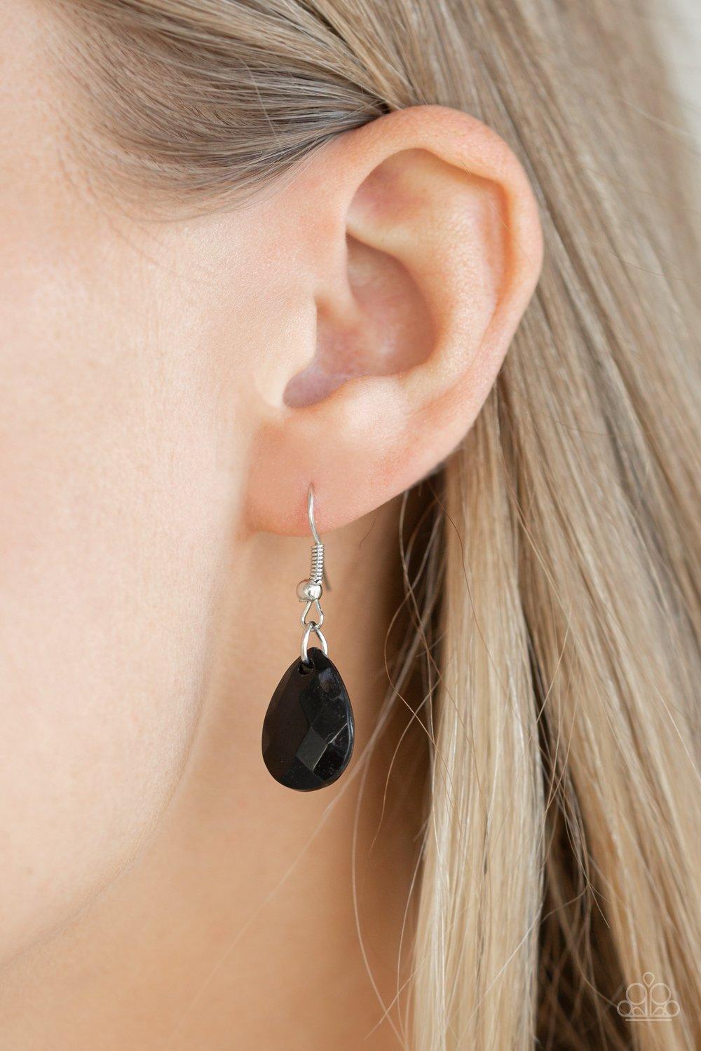 Paparazzi Accessories Life of the FIESTA - Black Two strands of silver chain are decorated in a flirtatious fringe of faceted black teardrops. Glittery beveled silver teardrops are sprinkled between the black beading, adding hints of shimmer to the vibran
