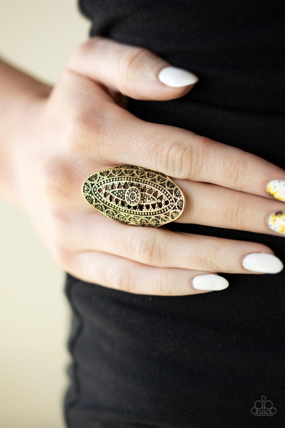 Paparazzi Accessories TRIBAL and Tribulations ~Brass Radiating with studded filigree, an ornate brass oval folds around the finger for a bold tribal look. Features a stretchy band for a flexible fit.