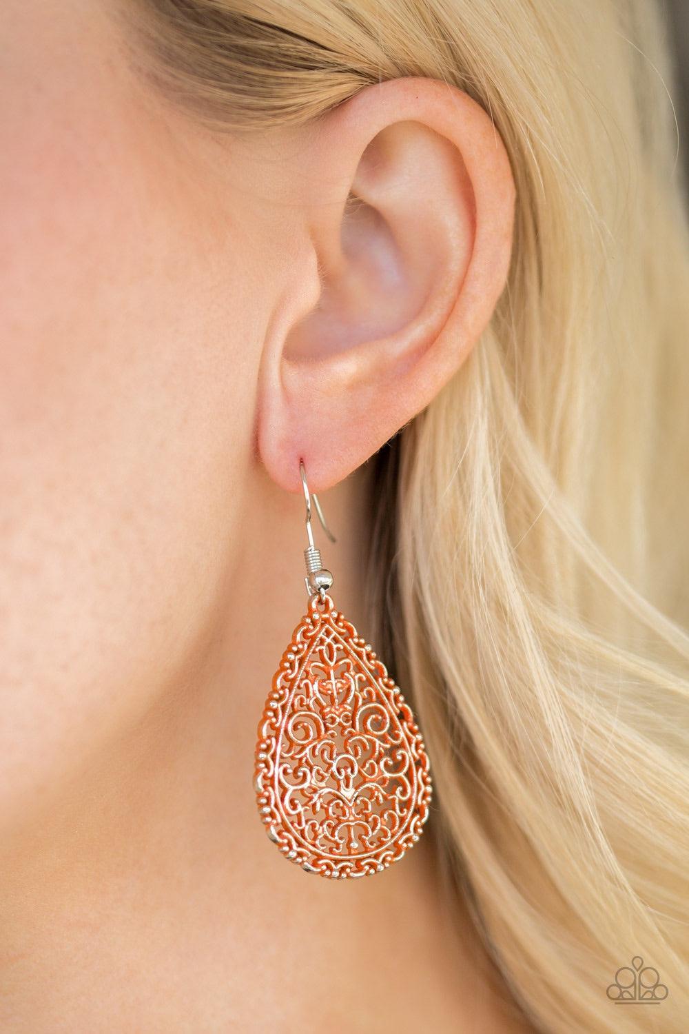 Paparazzi Accessories Indie Idol - Orange Brushed in a refreshing orange finish, vine-like filigree climbs a shimmery silver teardrop for a whimsical look. Earring attaches to a standard fishhook fitting. Jewelry