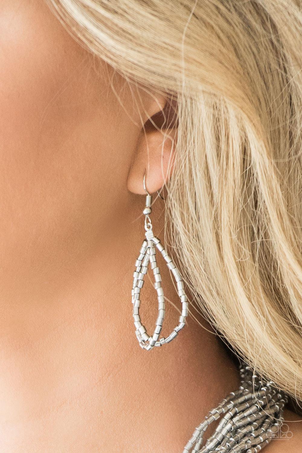 Paparazzi Accessories The Speed of STARLIGHT - Silver Strands of glistening silver seed beads subtlety twist below the collar, coalescing into a blinding shimmer. Features an adjustable clasp closure. Sold as one individual necklace. Includes one pair of