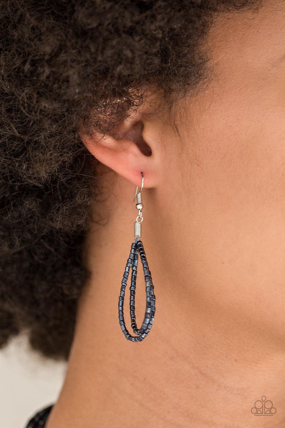Paparazzi Accessories Knotted Knockout - Blue Countless strands of metallic blue seed beads delicately knot together below the collar to create an unforgettable statement piece. Features an adjustable clasp closure. Jewelry