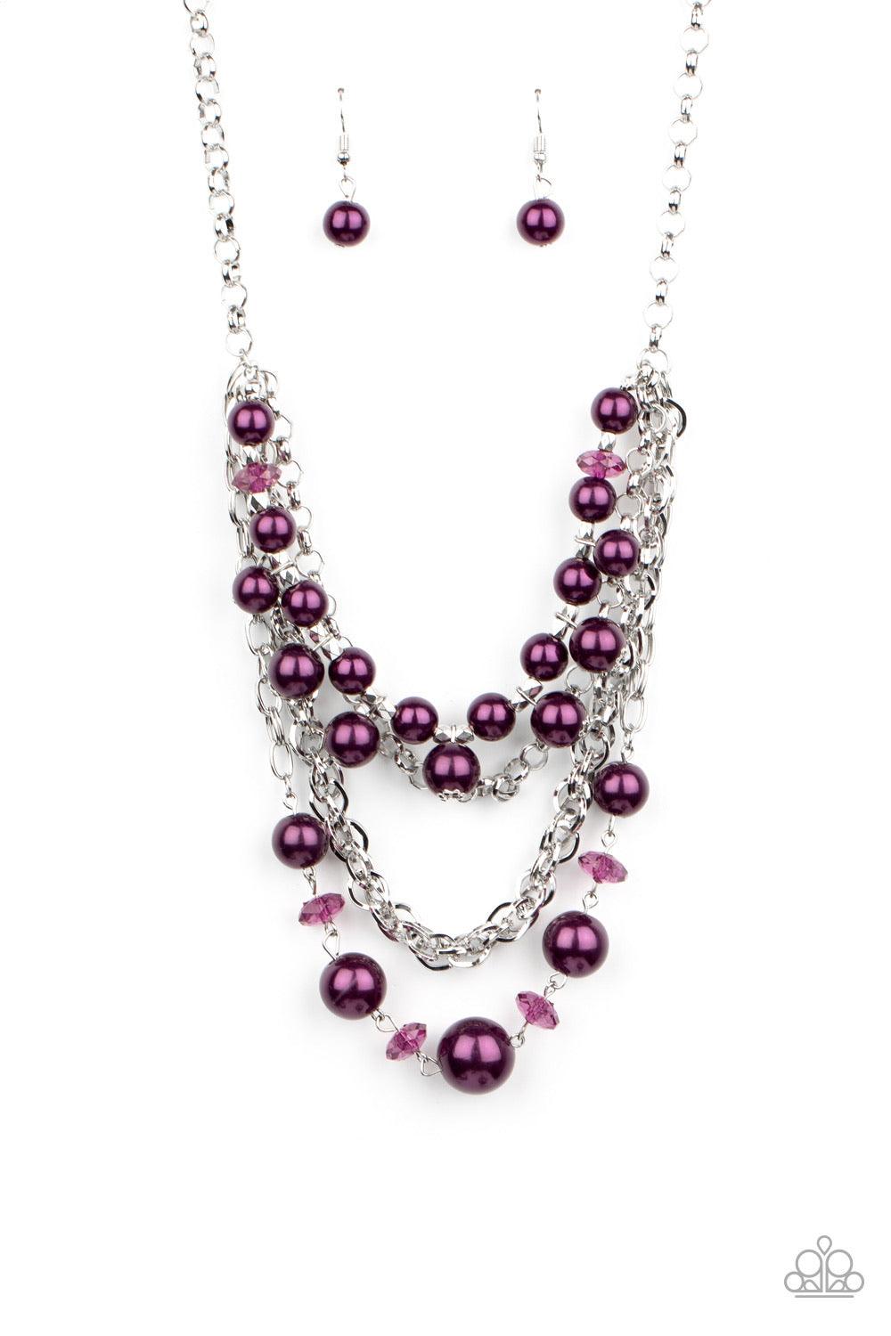 Paparazzi Accessories Rockin Rockette - Purple Varying in size, purple pearls, purple crystal-like beads, and faceted silver beads join with mismatched silver chains below the collar, creating a radically refined fringe. Features an adjustable clasp closu