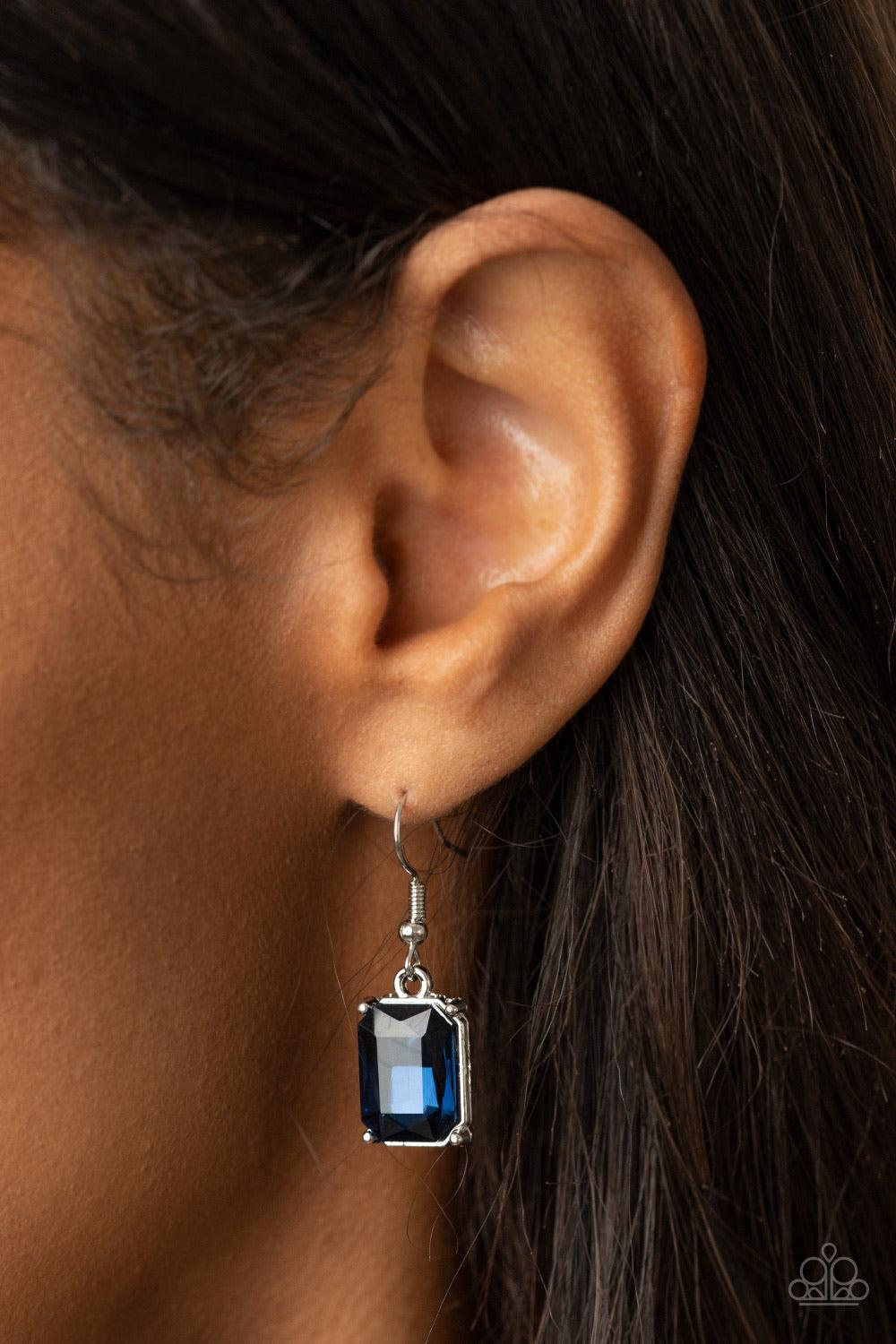 Paparazzi Accessories Deep Freeze Diva - Blue Featuring regal emerald style cuts, an oversized collection of blue rhinestones dramatically link below the collar for an icy finish. Features an adjustable clasp closure. Sold as one individual necklace. Incl