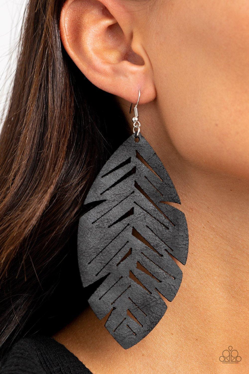 Paparazzi Accessories I Want To Fly - Black Featuring a rustic finish, a soft piece of black leather is cut and stenciled into an airy feather frame for a free-spirited look. Earring attaches to a standard fishhook fitting. Sold as one pair of earrings. J