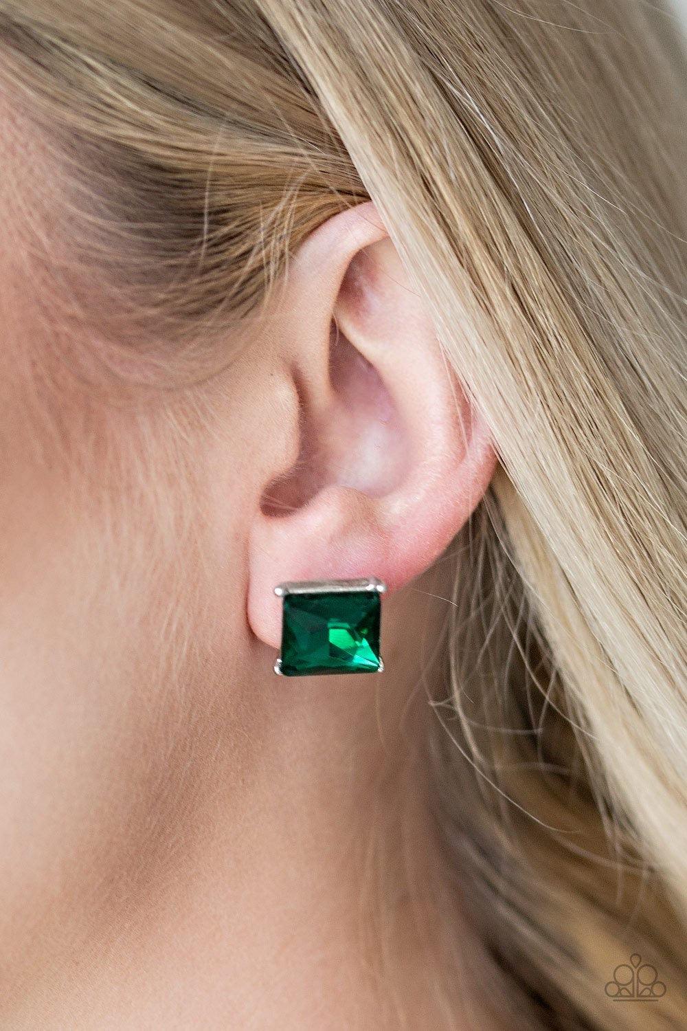 Paparazzi Accessories The Big Bang - Green Featuring a timeless princess style cut, a dramatic green gem is pressed into a sleek silver frame for a timeless look. Earring attaches to a standard post fitting. Jewelry
