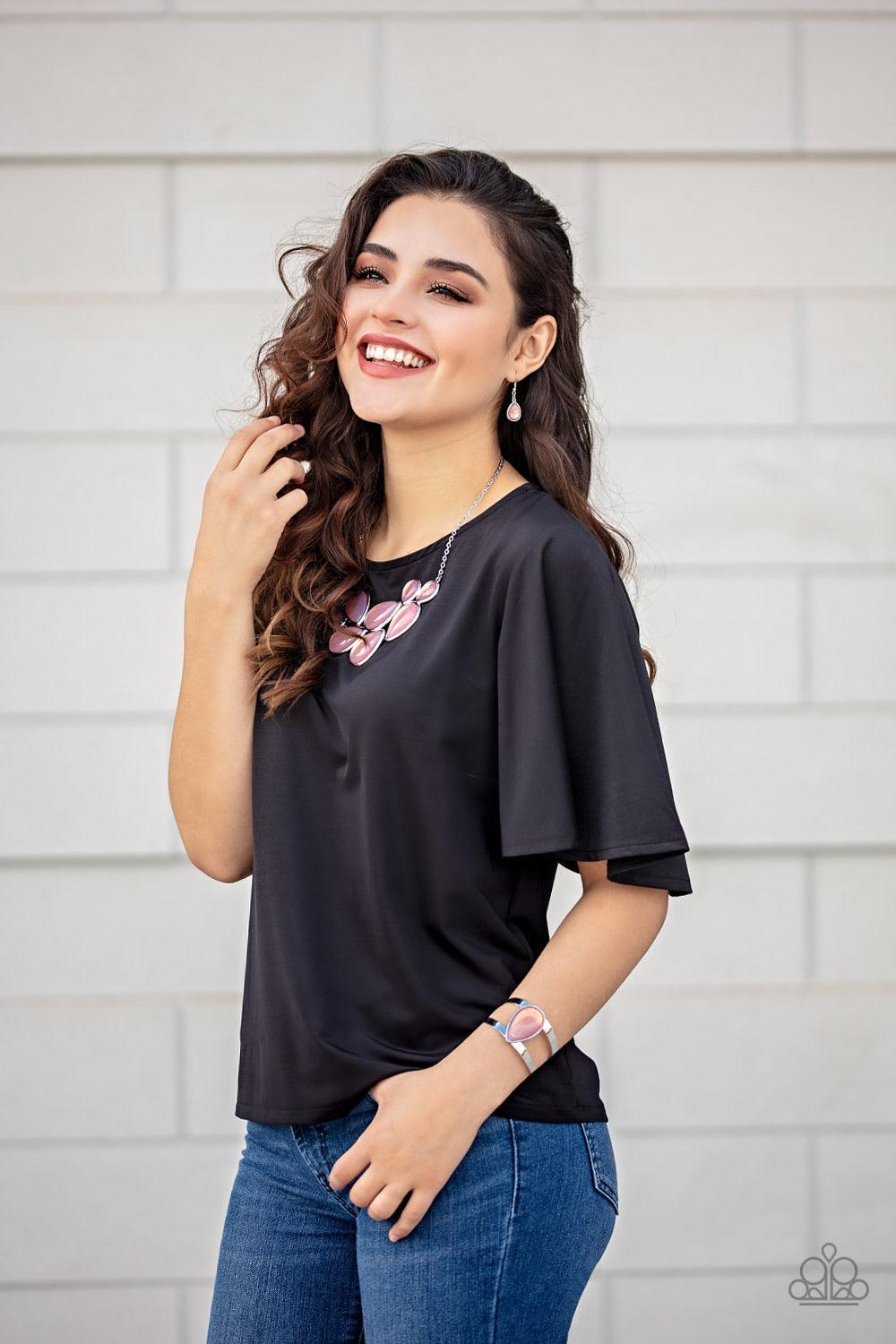 Paparazzi Accessories Optimal Opalescence - Pink Featuring a sleek silver frame, an opalescent pink teardrop bead sits atop an airy silver cuff in an ethereal fashion. Sold as one individual bracelet. Jewelry