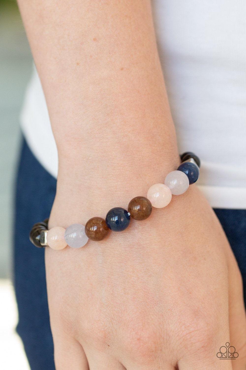 Paparazzi Accessories Ascent - Multi An earthy compilation of shiny black beads, silver cube beads, and glassy stone beads are threaded along a stretchy band around the wrist for a seasonal look. Jewelry