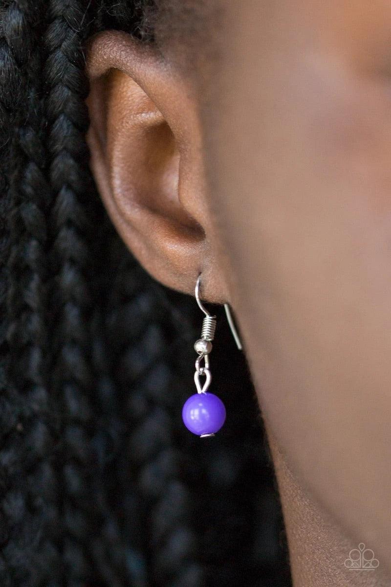 Paparazzi Accessories Beach Party Pageant - Purple Vivacious purple and dainty silver beads trickle along two shimmery silver chains, creating colorful layers down the chest. Features an adjustable clasp closure. Sold as one individual necklace. Includes